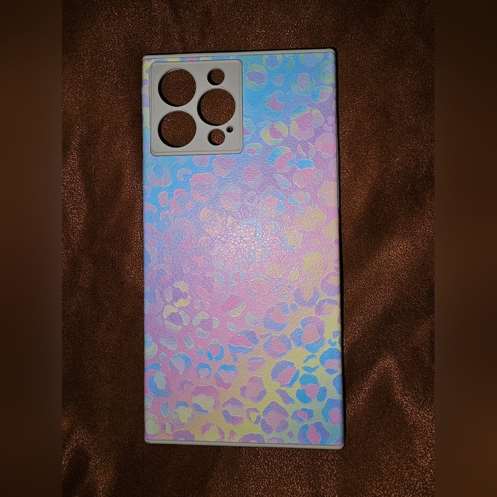 IPhone 13 Pro Max  phone case in iridescent pastel leopard design.